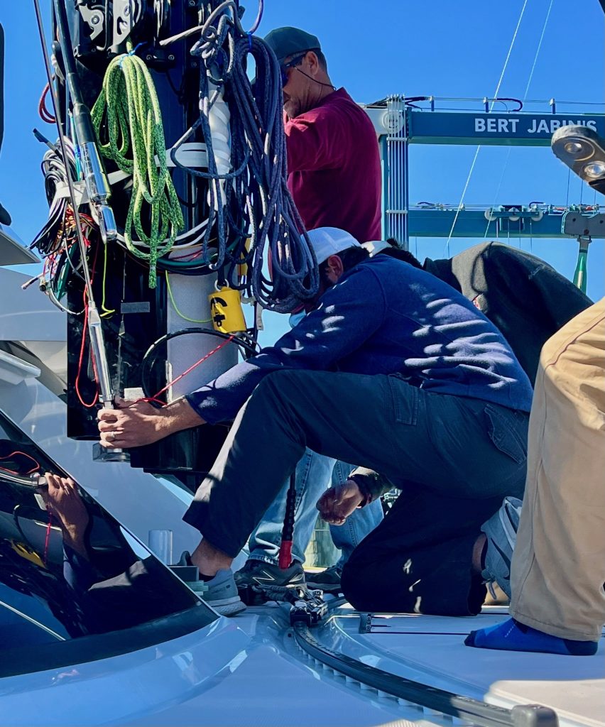 Off-Piste Getting Her Mast Put On